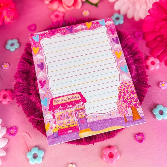 Romance bookshop notepad on a pink backdrop