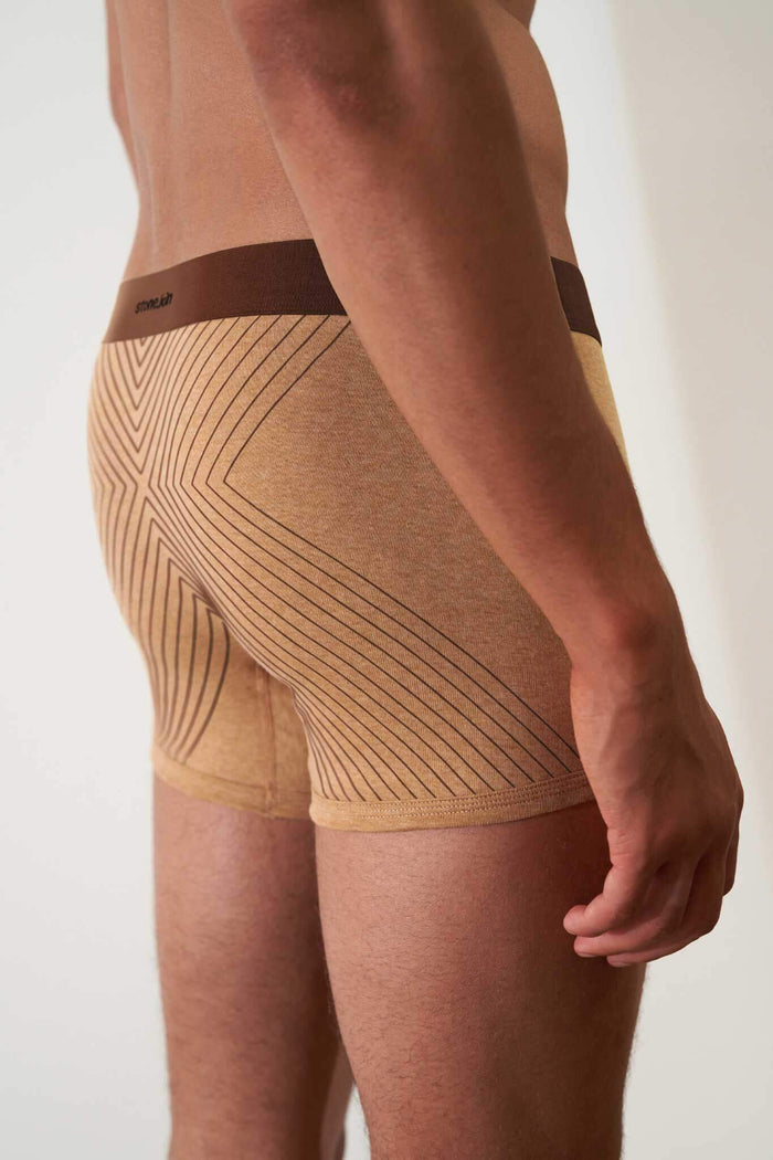 Boxer brief in organic cotton rib, camel with brown cross, showcasing comfort and GOTS certified non-toxic fabric.