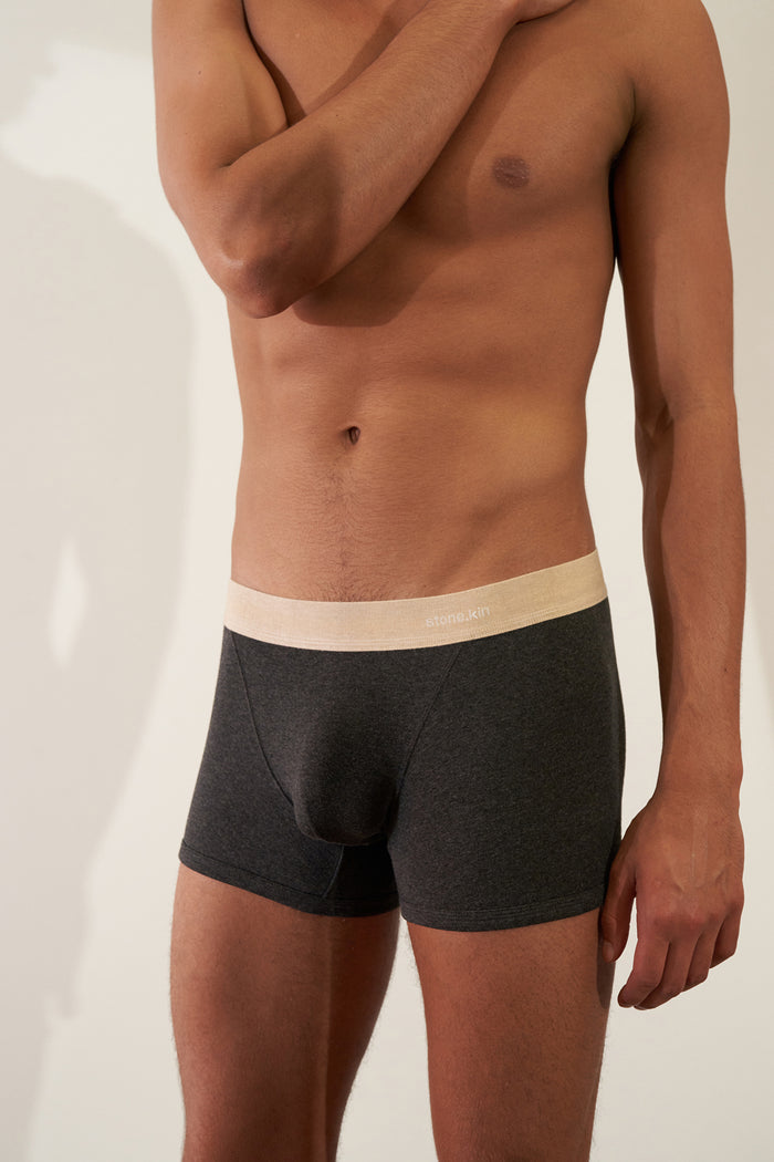 Boxer Brief in Organic Cotton Rib - Tar / Sand worn by a model, showcasing softness and stretch.