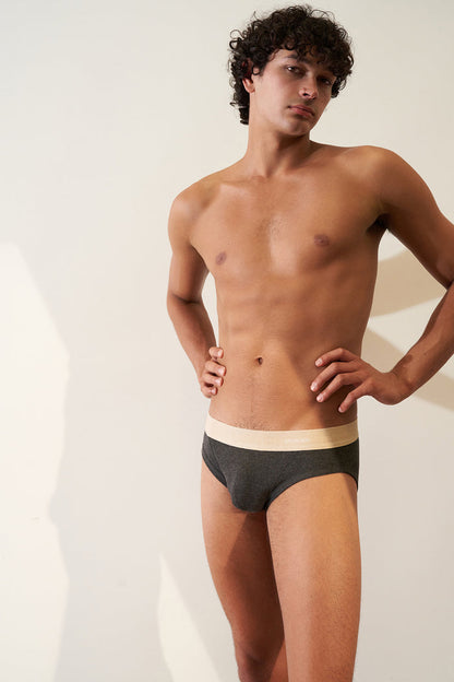 Men's Brief in Organic Cotton Rib - Tar / Sand model showcasing a clean fit and breathable comfort.