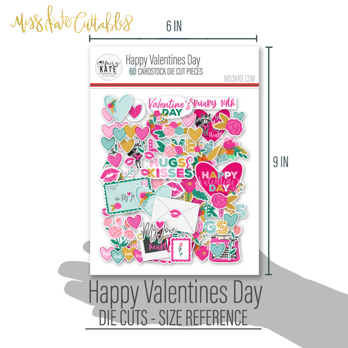 Happy Valentines Day Die Cuts, size guide shown in hand for scale, showing pre-cut scrapbook embellishments for layouts, handmade cards, journals, mini albums, memory pages, and layered paper crafts. Buyer theme: Valentine Die Cuts & Scrapbook Ephemera. Happy Valentines Day die cuts with hearts, florals, love notes, raccoons, kisses, typewriter, camera and romantic phrases. Color palette includes Hot pink, blush pink, aqua, emerald teal, mustard gold, charcoal black and white