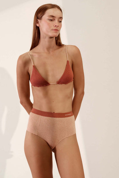 Hi Brief in Organic Cotton Rib - Nude and Rust worn by model, showcasing a soft, breathable design with high-waisted silhouette.