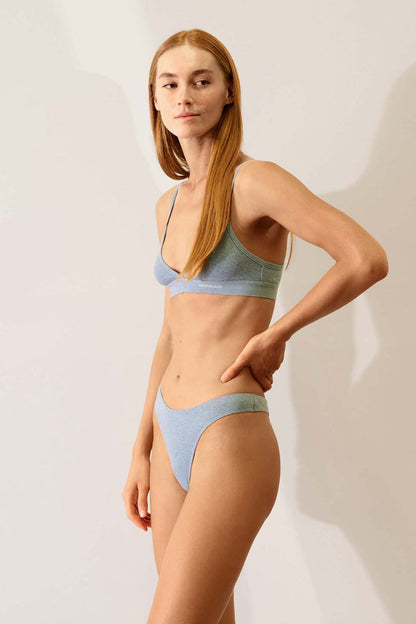 Hi Thong in Organic Cotton Rib - Lake worn by a model showcasing a sporty look with soft, breathable fabric.