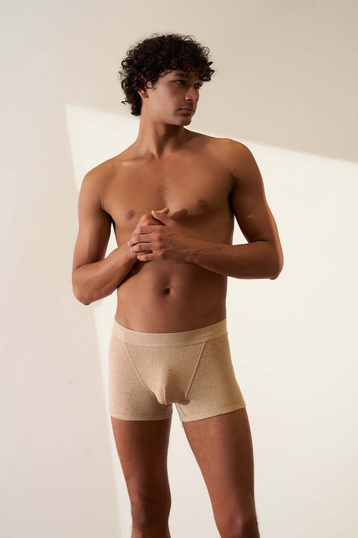 Boxer brief in organic cotton rib, sand color, featuring tar cross design, GOTS certified for comfort and sustainability.