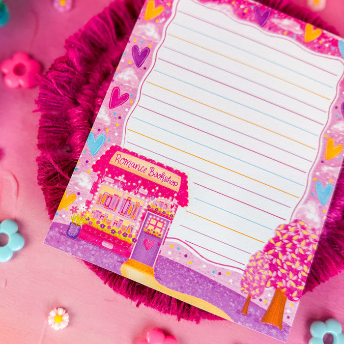 Romance bookshop notepad on a pink backdrop