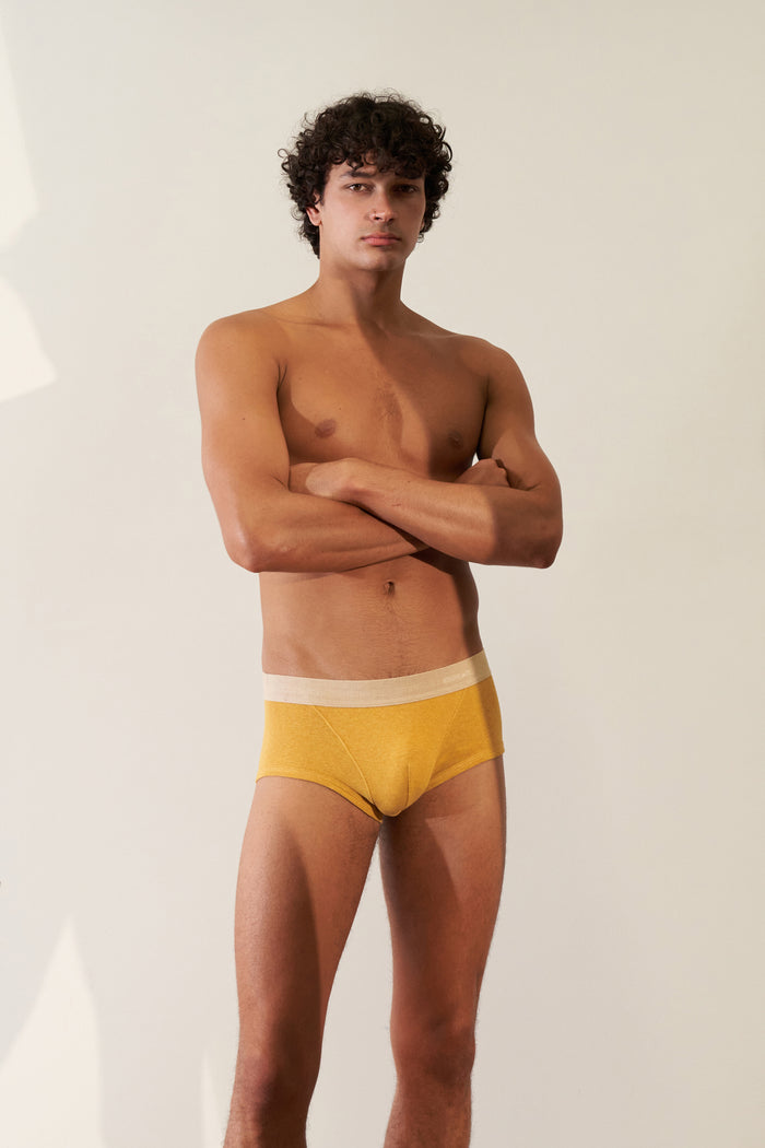 Trunk in Organic Cotton Rib - Mustard / Sand, modern cut with comfort and support, wearing mustard rib underwear.